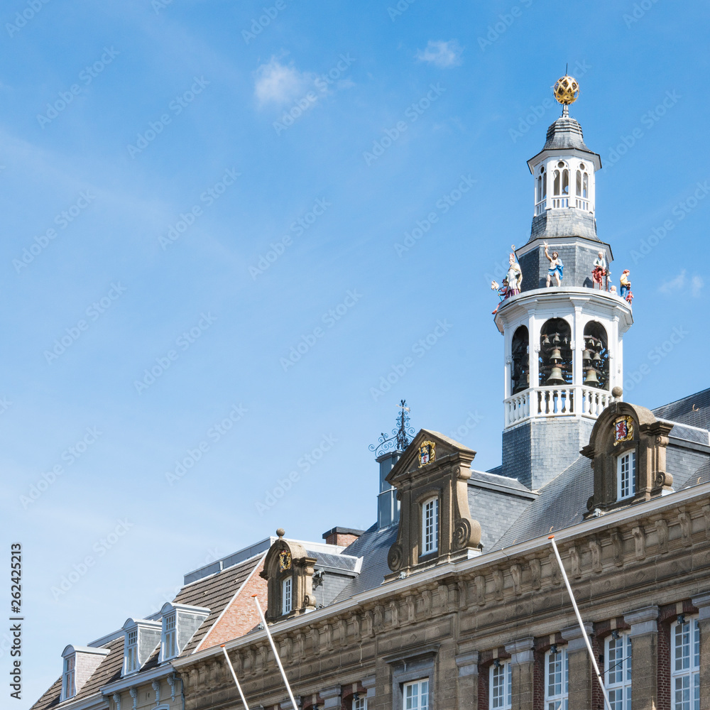 Obraz premium town hall with carillon in Roermond, The Netherlands. Space for text