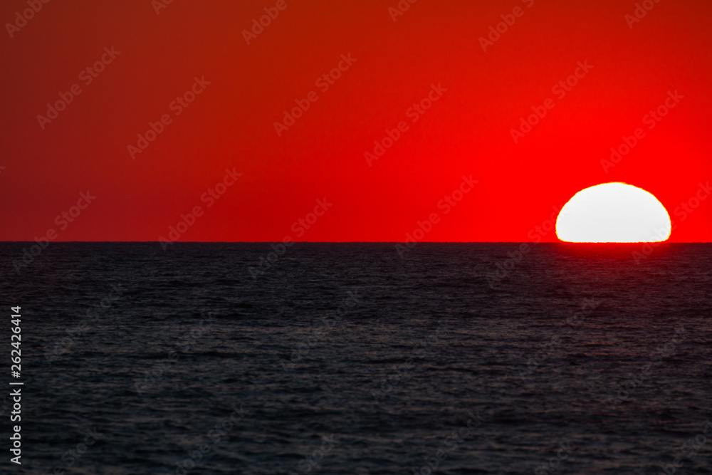 Ionian sea , red sunset, Salento, Italy