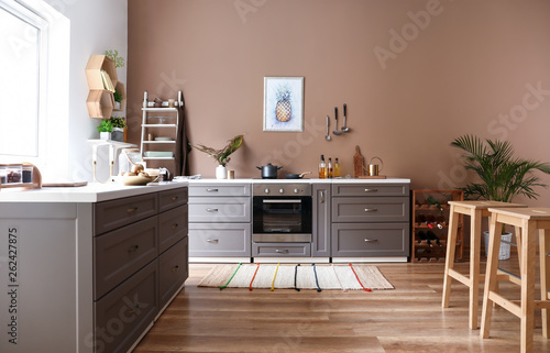 Modern interior of kitchen with stylish furniture © Pixel-Shot