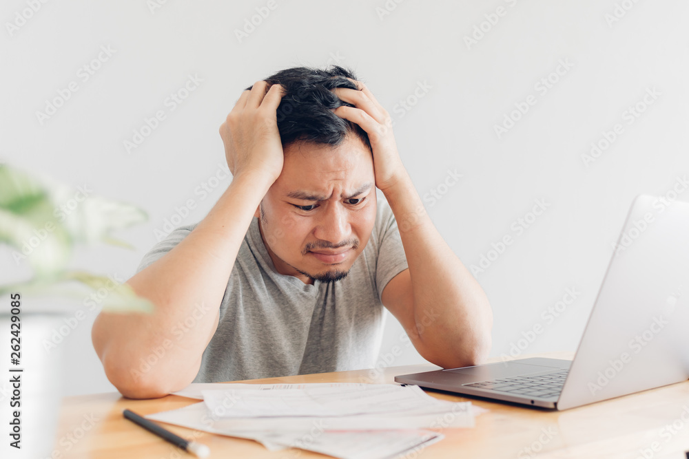 Sad man has problems with billing and debts. Sad man has problems with billing and debts.