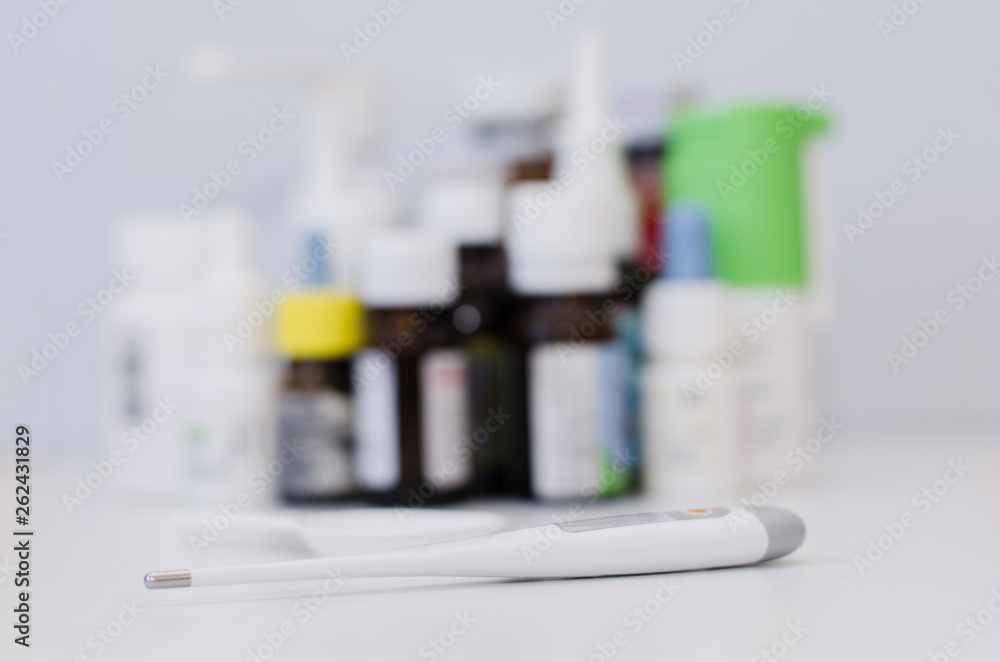 medicine bottles for children and a thermometer medicine bottles for children and a thermometer