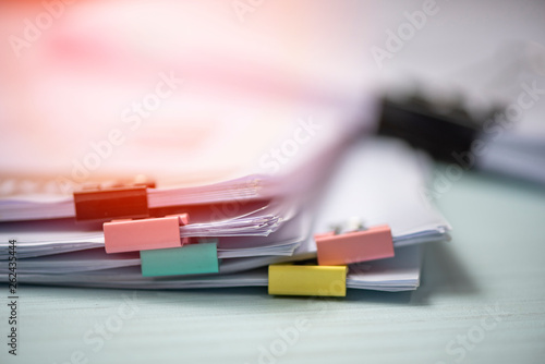 Report paper document present financial and business report with colorful paper clip