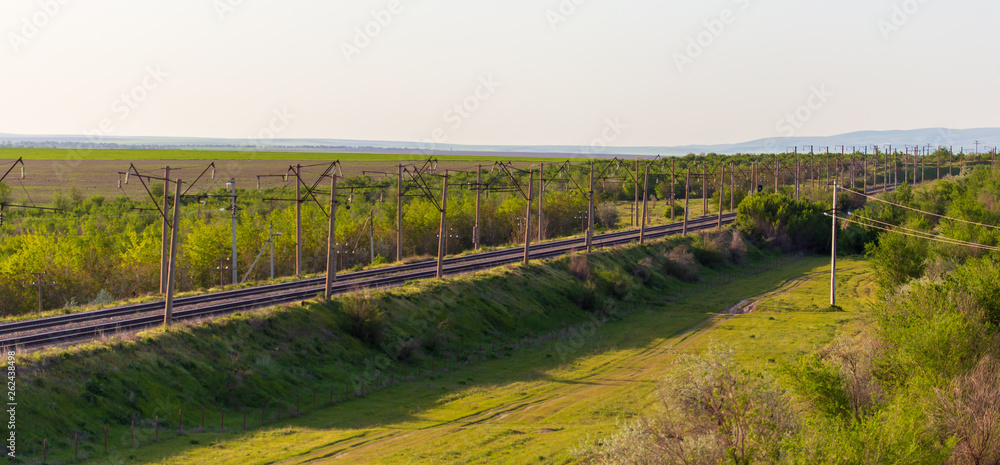 Railway in Kazakhstan steppe in spring