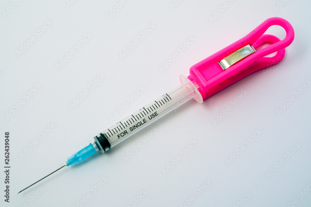 Fototapeta premium medical syringe on white background