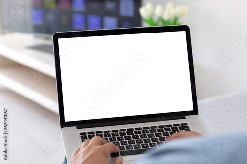 male hands on keyboard laptop with isolated screen in room