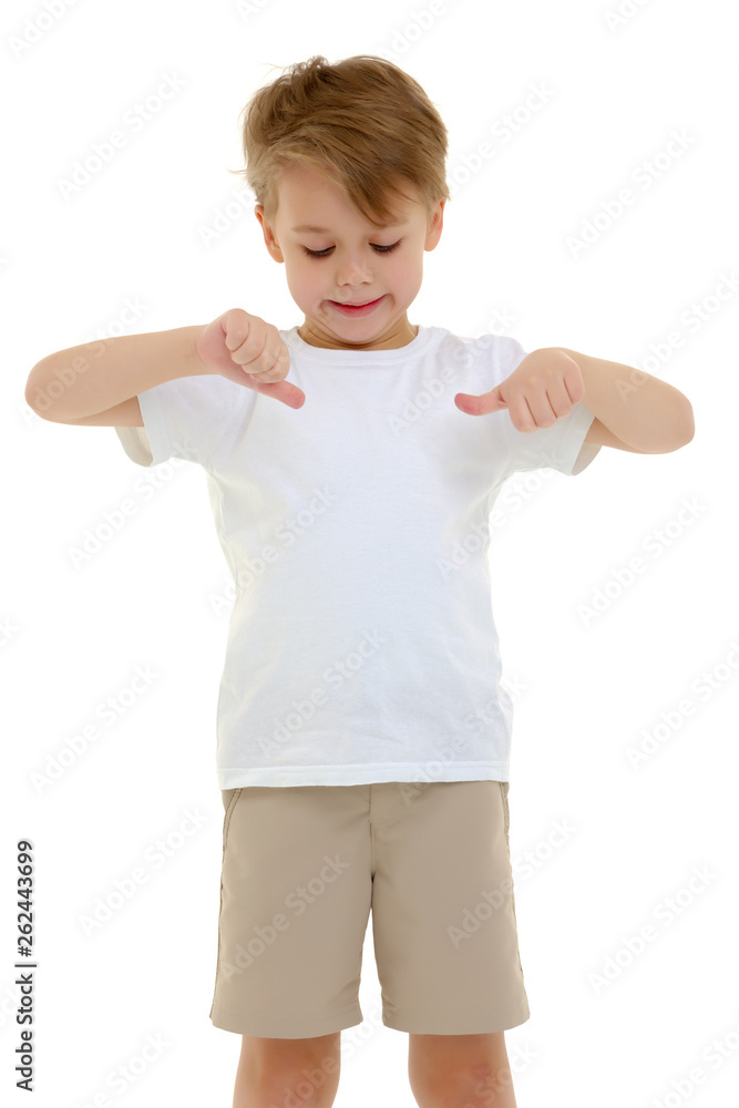A little boy in a pure white T-shirt points his fingers at her. A little boy in a pure white T-shirt points his fingers at her.