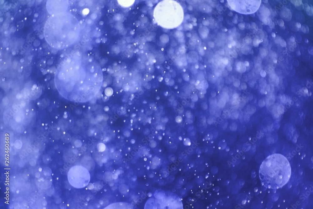 Obraz premium blue huge amount falling glitter one color bokeh texture - beautiful abstract photo background