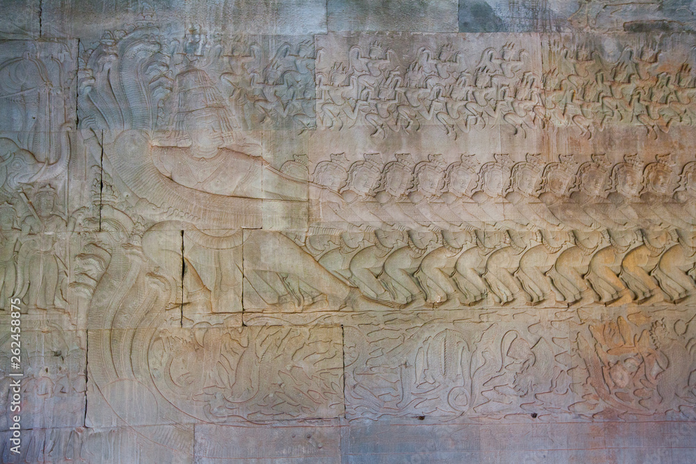 Obraz premium Stone Carving, all around on the wall at Angkor wat.