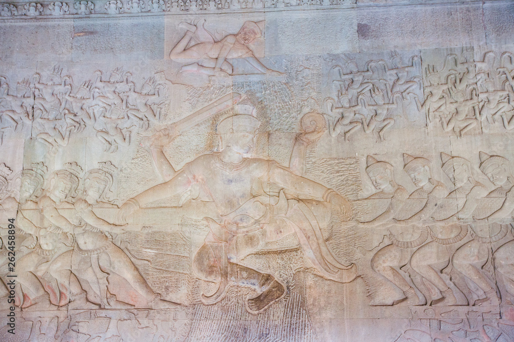 Obraz premium Stone Carving, all around on the wall at Angkor wat.