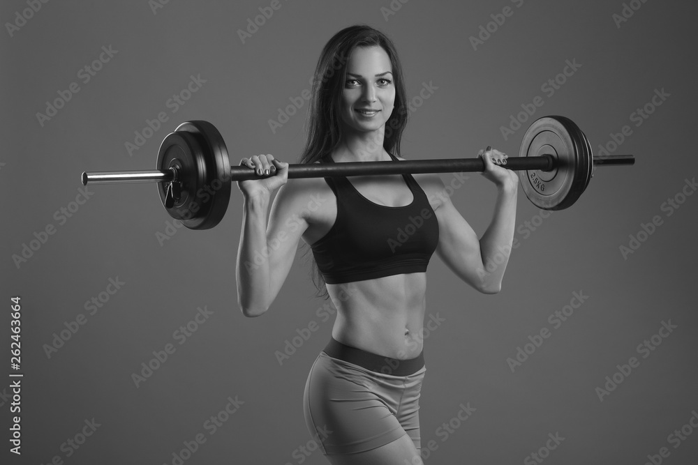 Obraz premium Fitness young girl doing exercises