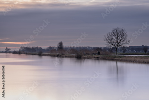A quiet morning on the waters of Kinderdijk, Alblasserdam, the Netherlands © Anges van der Logt