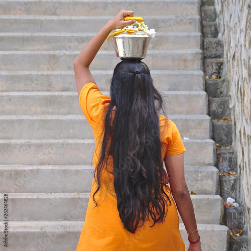 Rear view of Hindu devotee