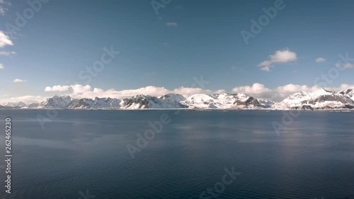 Wallpaper Mural Drone shot of distant snowy mountains in the Lofoten Islands, Norway during winter Torontodigital.ca