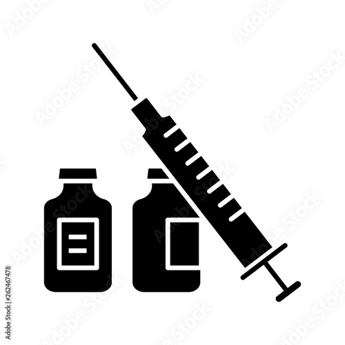 Syringe and vials glyph icon
