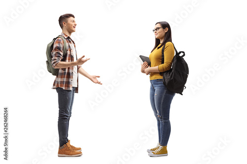 Male and female students talking