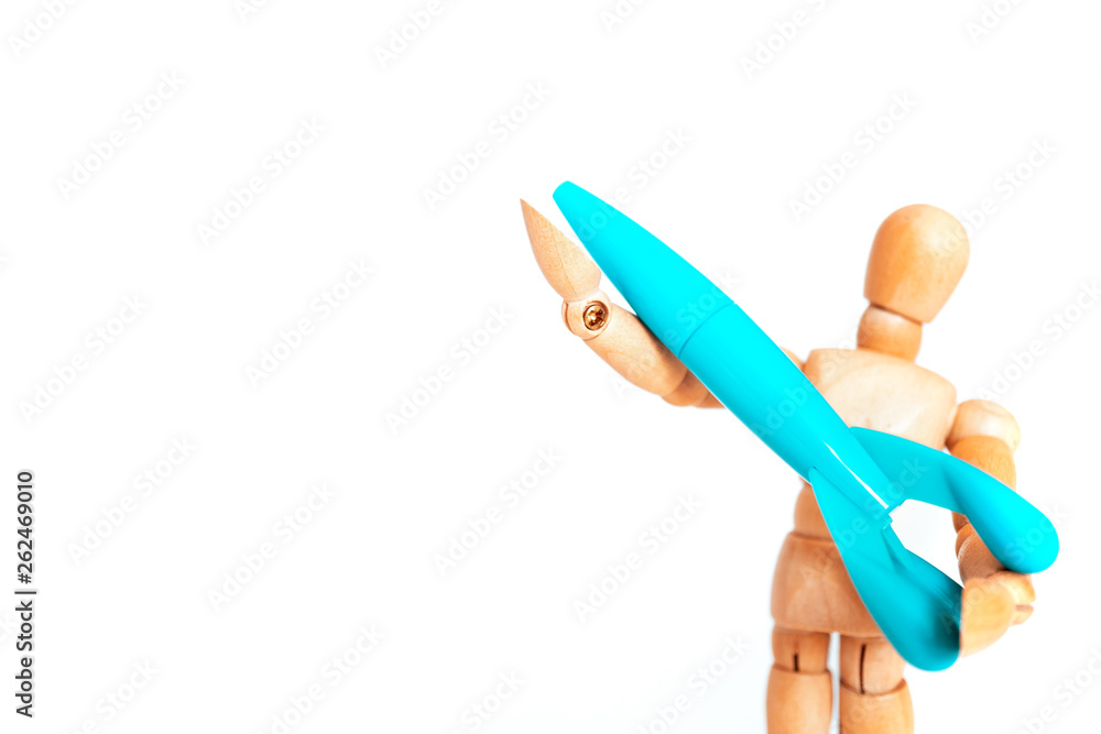 blue plastic space craft holding by wooden figure on white background, explorer and education concept blue plastic space craft holding by wooden figure on white background, explorer and education concept