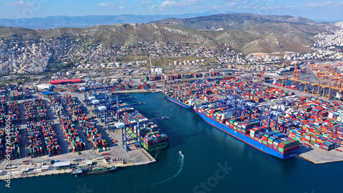 Aerial photo of industrial cargo container loading terminal located in mediterranean port