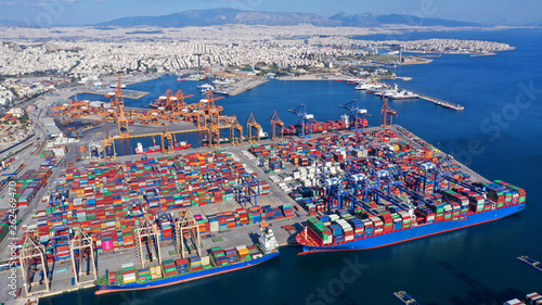 Aerial photo of industrial cargo container loading terminal located in mediterranean port