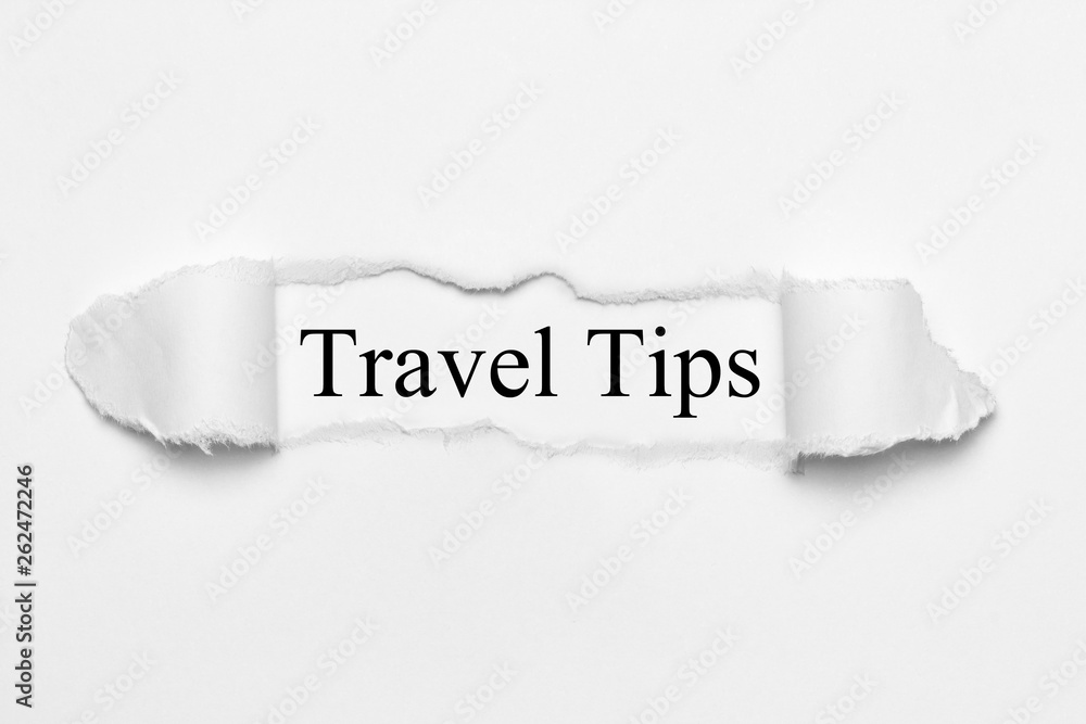 Travel Tips on white torn paper Travel Tips on white torn paper