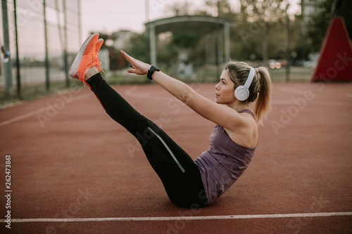 Fitness woman training abs ...