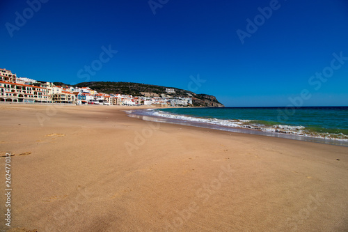 Gold beach in Sesimbra with sand in the foreground © Artur Gomes