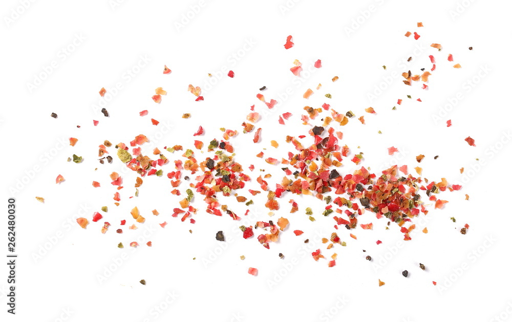Colorful ground pepper grains isolated on white background, top view Colorful ground pepper grains isolated on white background, top view