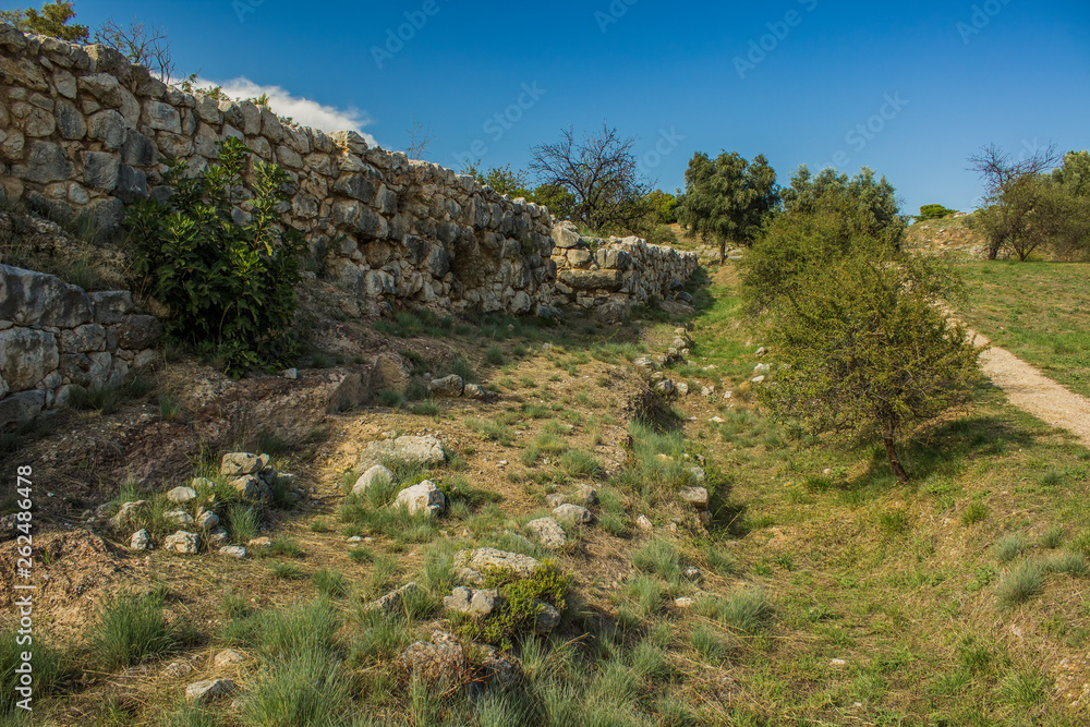 archeology stone ruins in park outdoor country side green hill land