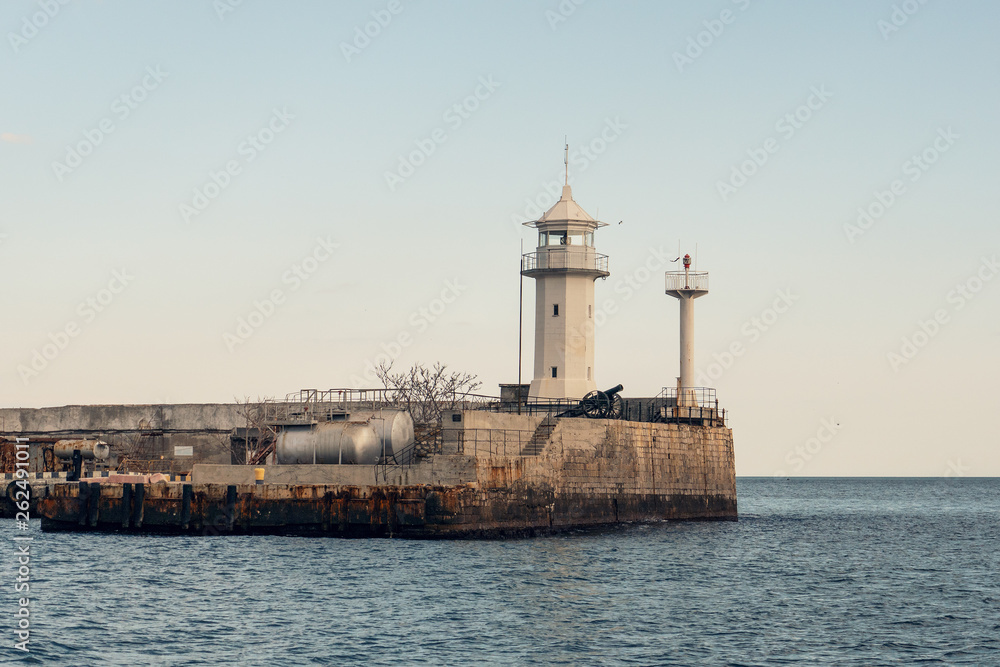 Lighthouse on Yalta embankment, Crimean resort on Black Sea
