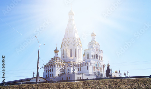 Church closeup against the blue sky.