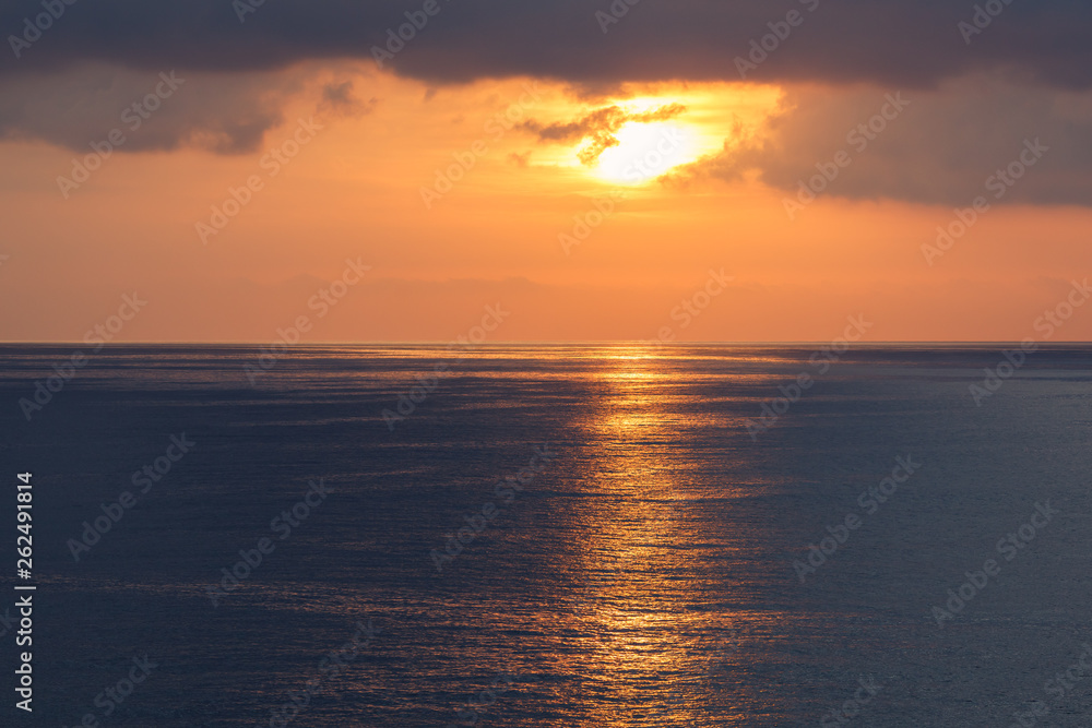 sunrise at ocean seascape with reflection