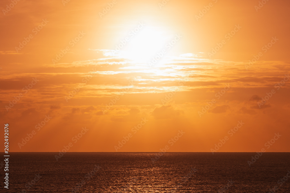 orange sun at ocean seascape