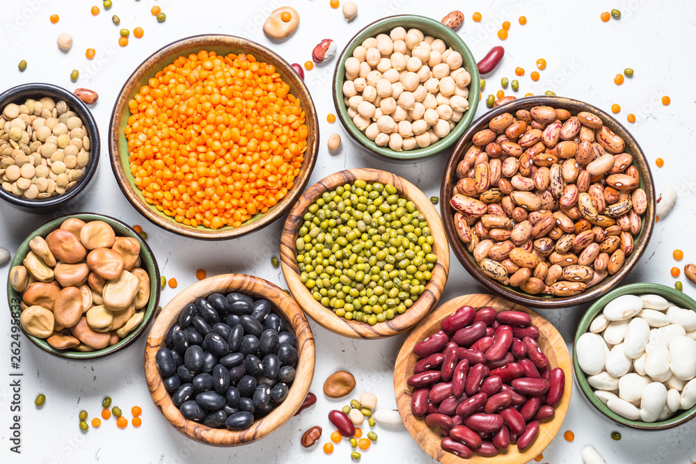 Legumes, lentils, chikpea and beans assortment on white. Legumes, lentils, chikpea and beans assortment on white.