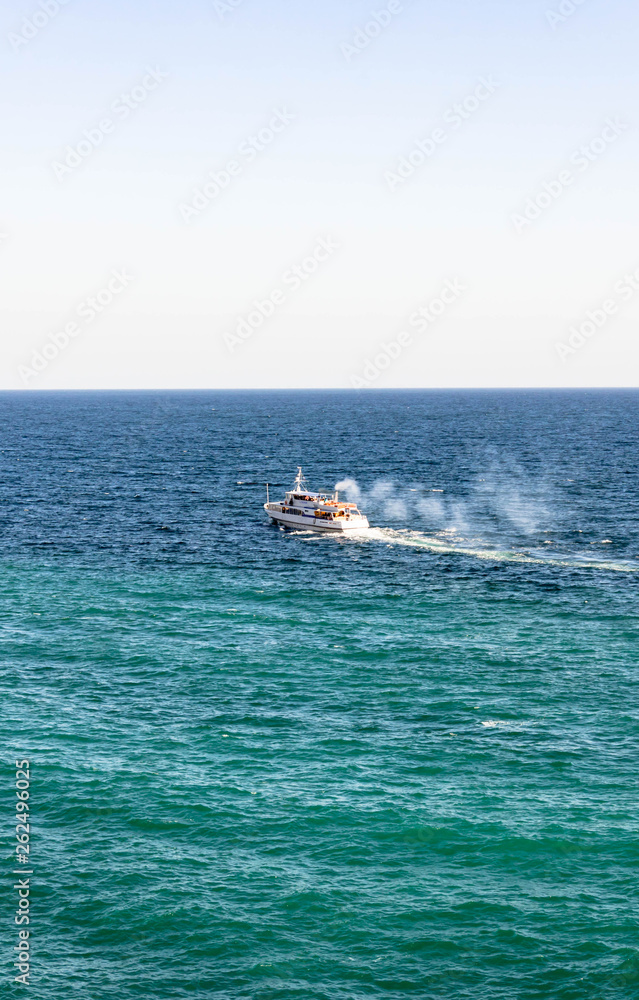 Gaspra, Yalta, Crimea, RUSSIA - OCTOBER 28, 2018: ship in the Black Sea. View from Lastochkino Gnezdo Swallow nest.