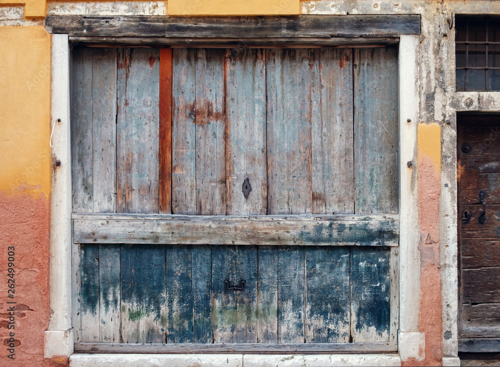 Window with color wooden shutters Window with color wooden shutters