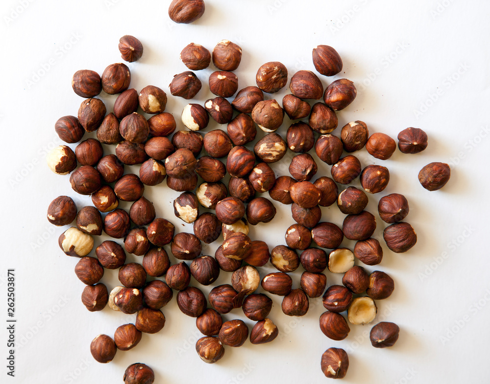 hazelnuts on white background