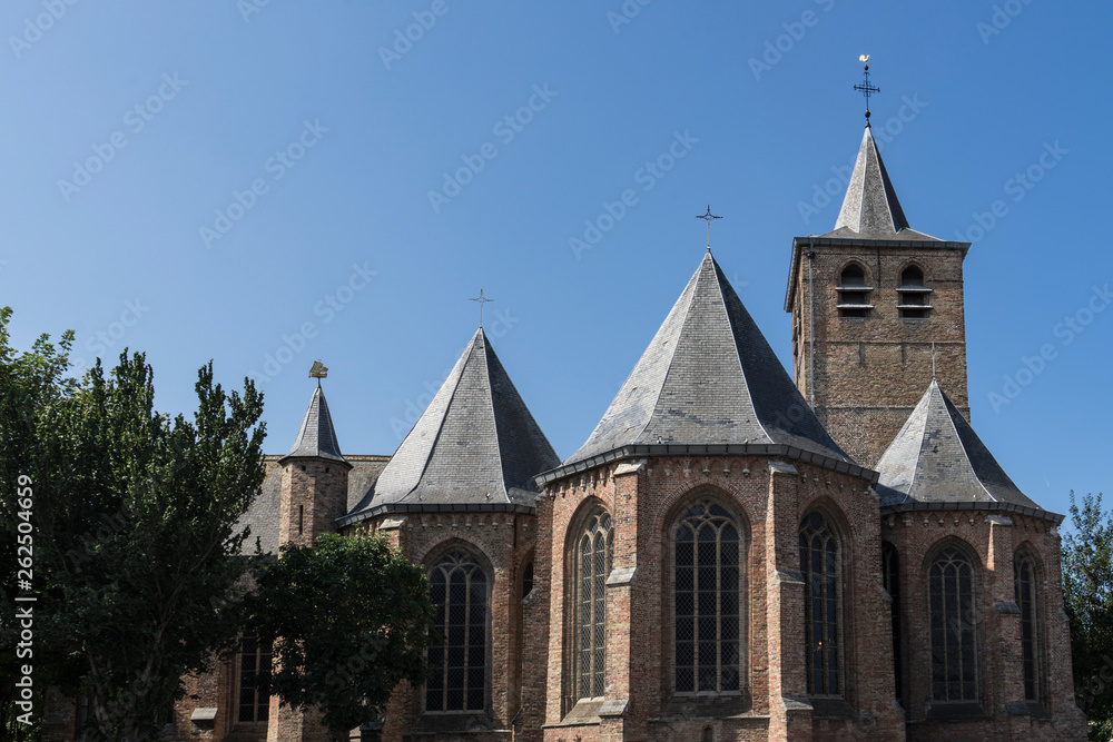 Sint Antonius Abt Church in Blankenberge, Belgium. Blue sky, space for text