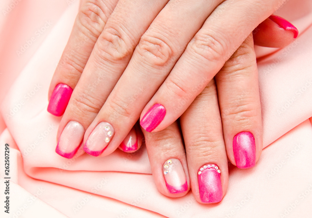 Woman's nails with beautiful manicure fashion design Woman's nails with beautiful manicure fashion design