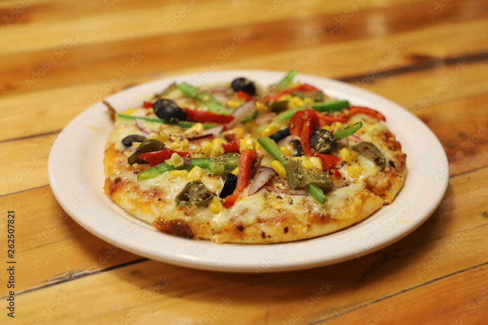 Vegetarian pizza in a plate Vegetarian pizza in a plate