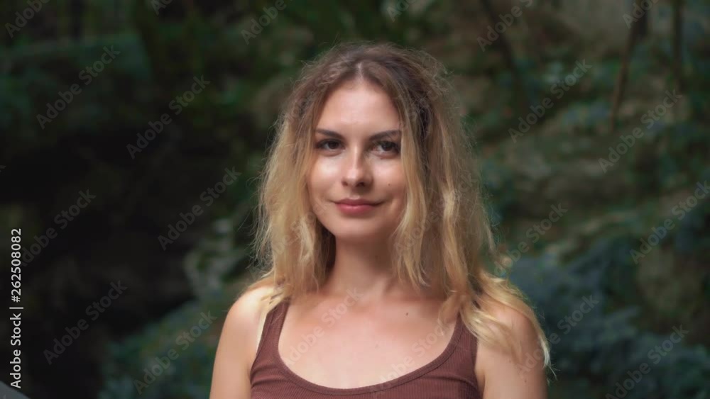 portrait photography of a shy cute girl with blond hair and brown eyes, a lady slowly lifts her eyes and gently smiles, a cheerful model, positive emotions, natural beauty portrait photography of a shy cute girl with blond hair and brown eyes, a lady slowly lifts her eyes and gently smiles, a cheerful model, positive emotions, natural beauty