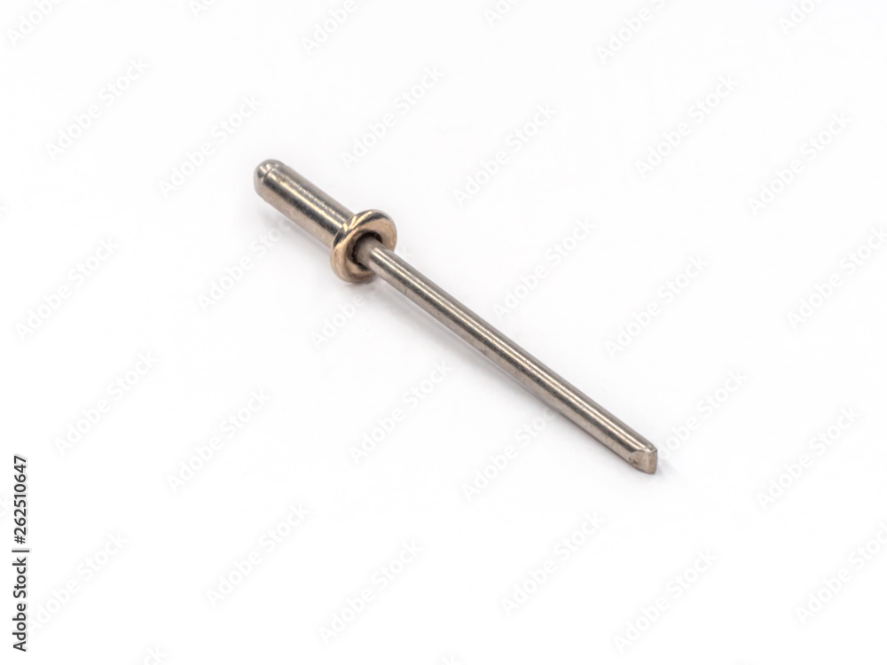 Stainless steel flat pop rivet with stainless steel mandrel on white. Stainless steel flat pop rivet with stainless steel mandrel on white.