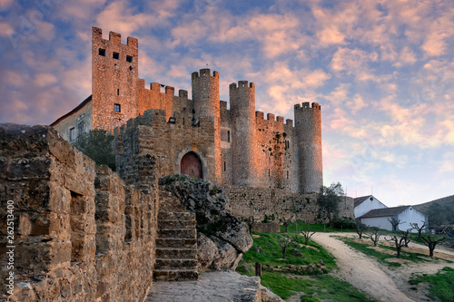 Castle in the city of Obidos Portugal at sunset photo