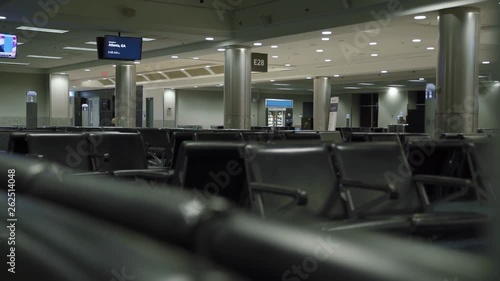 Empty seating area at an airport at 3am in the morning. photo