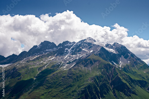 Panoramic view of a mountain group at the Lukmanier pass in Switzerland