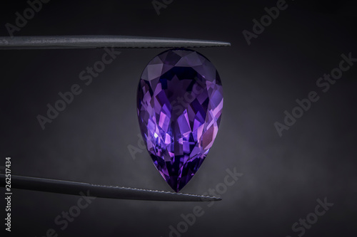 Dark amethyst Pear Shaped and rare texture in twezzer black background