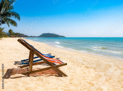 View of two chairs on the beach, blue sky Summer vacation concept Consists of travel websites