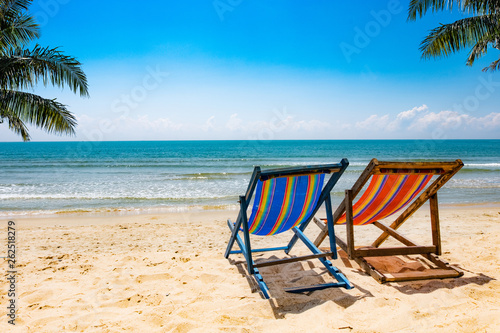 View of the chair on the beach  blue sky Summer vacation concept Consists of travel websites