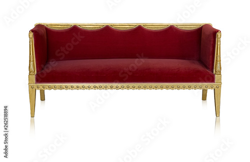 Ancient golden sofa isolated on white background