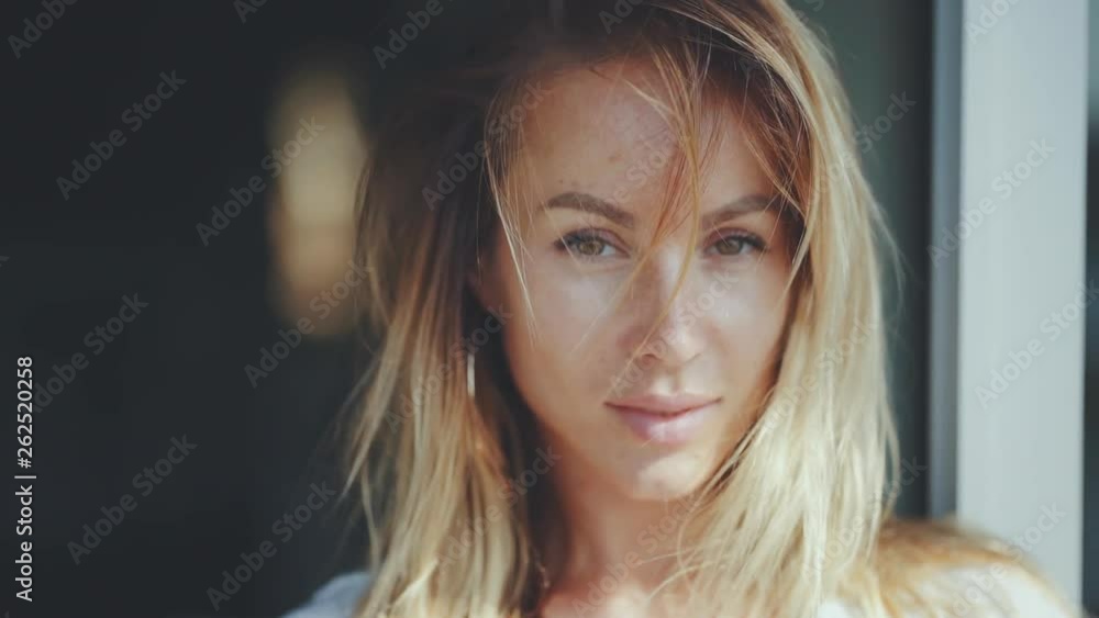 beautiful woman looking at camera in slow motion beautiful woman looking at camera in slow motion