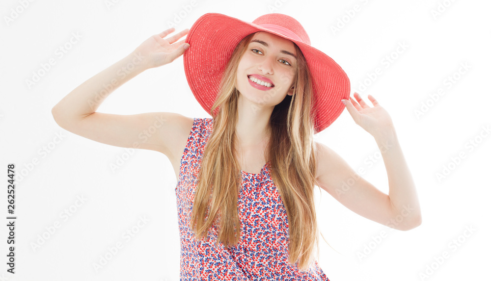 Portrait of a smiling attractive woman in summer dress and hat posing while standing and looking at camera isolated over white background. Portrait of a smiling attractive woman in summer dress and hat posing while standing and looking at camera isolated over white background.