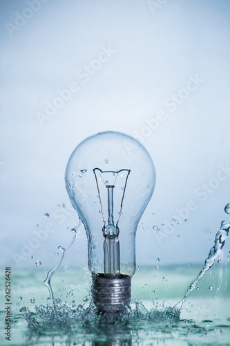 Bulb lamp with motion freezed water splashes.